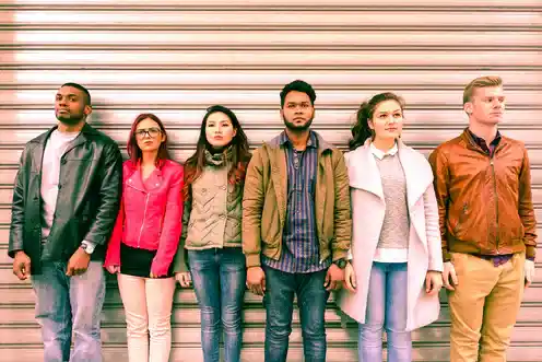 group of men and women standing next to each other