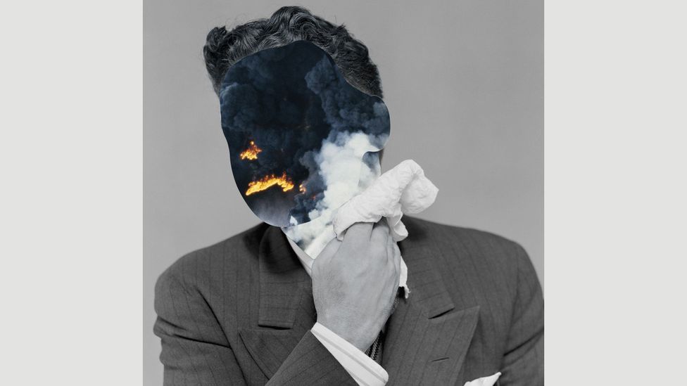 image of a person wiping colour off their face